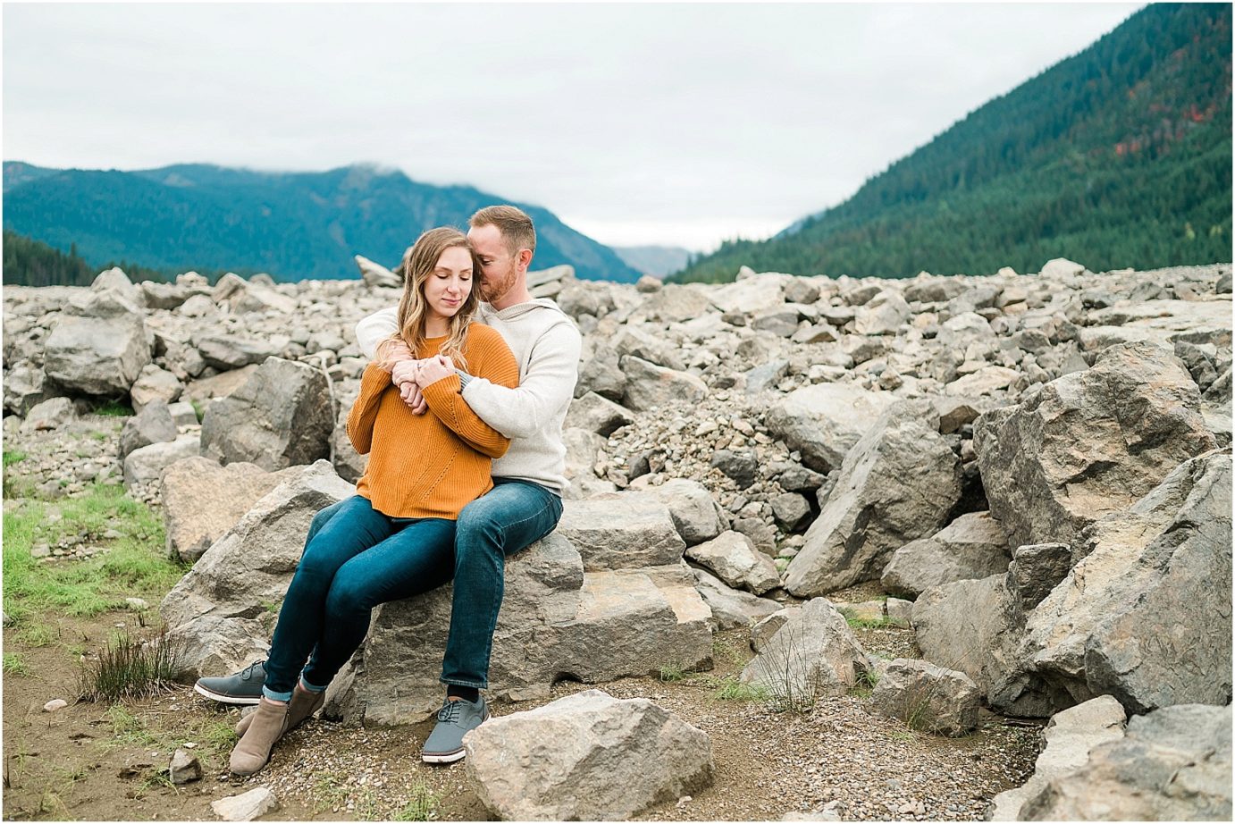 Keechelus Lake Engagement Session Snoqualmie Pass Sean and Megan sitting on the rocks