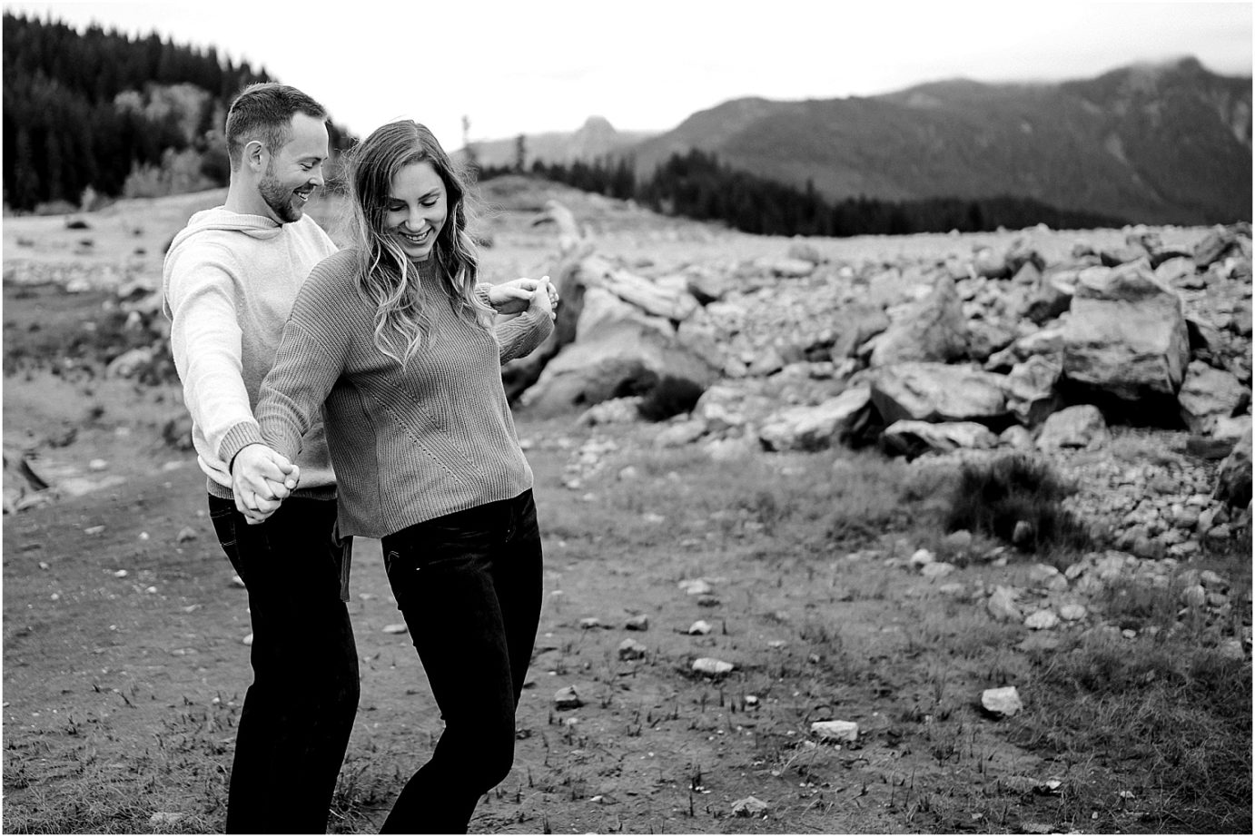 Keechelus Lake Engagement Session Snoqualmie Pass Sean and Megan sitting on the rocks