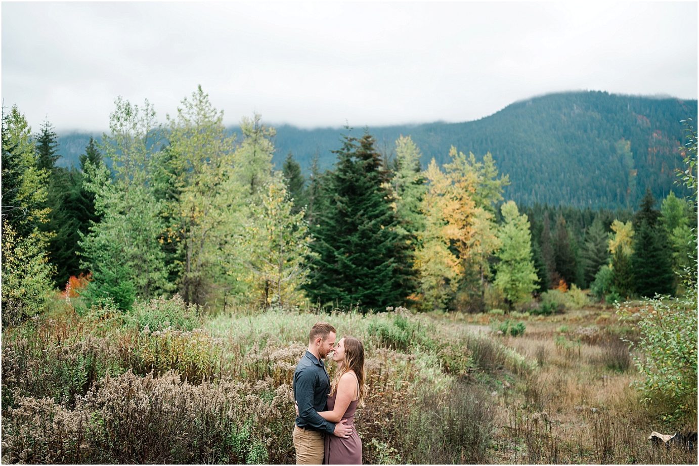 Keechelus Lake Engagement Session Snoqualmie Pass Sean and Megan standing in a field