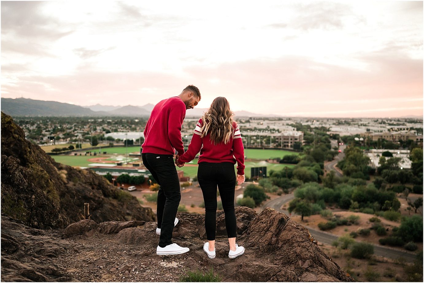 Desert engagement session tempe photographer Mansel and Rita on top of the rock