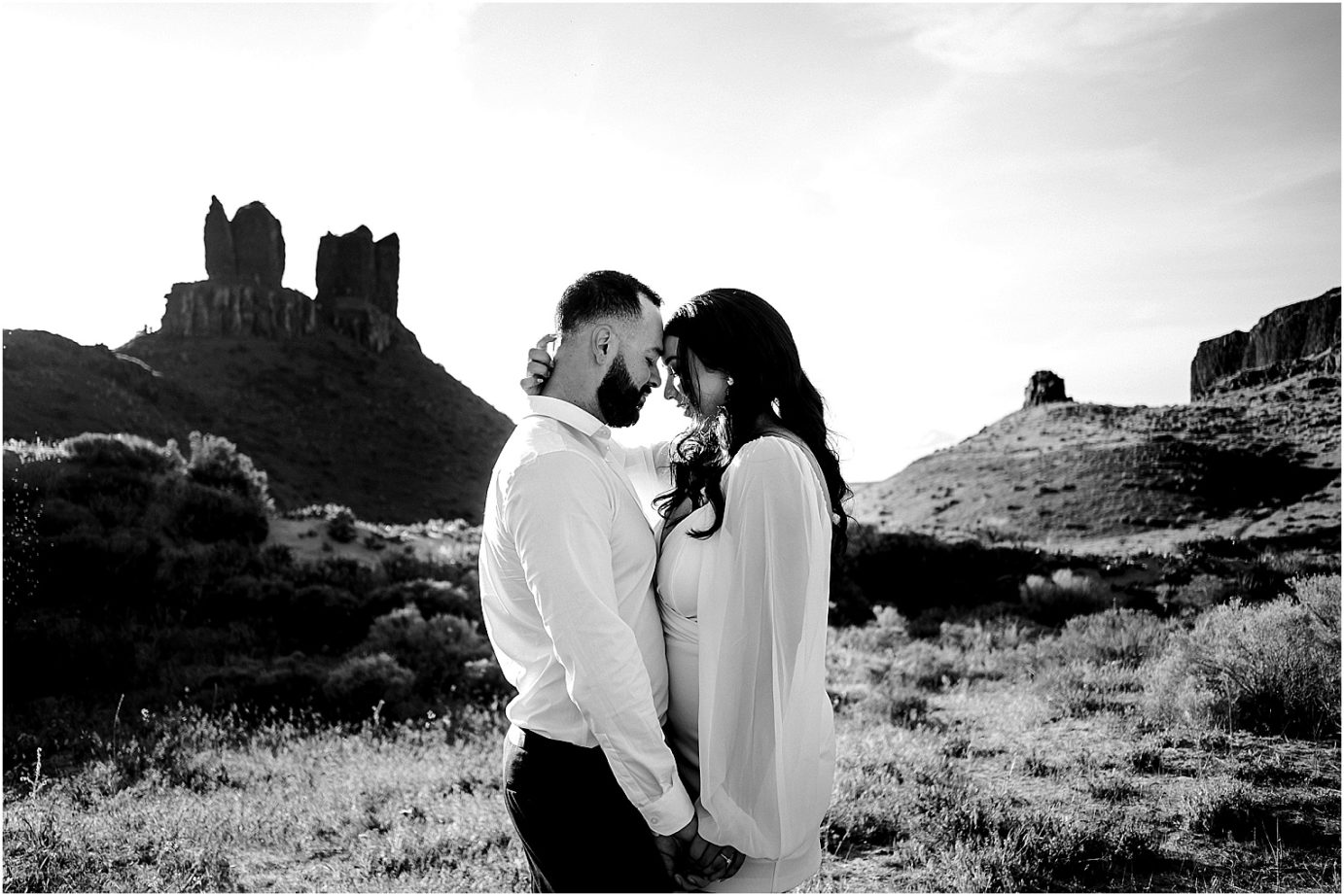 Desert Engagement session Eastern Washington Julio and Marissa hugging by Twin Sisters