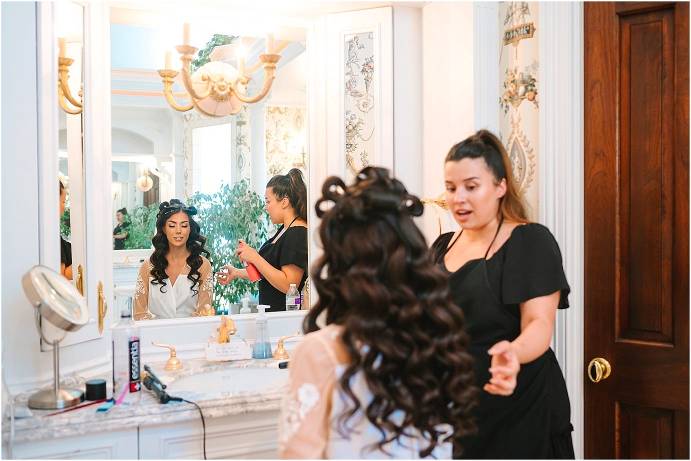 Disney-inspired Oakshire Estate Wedding bride getting hair done