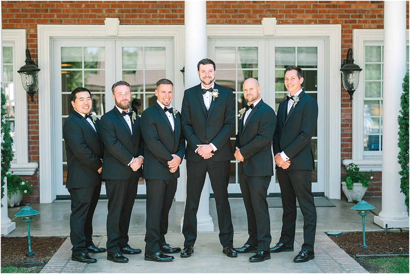 Disney-inspired Oakshire Estate Wedding groom with groomsmen portraits