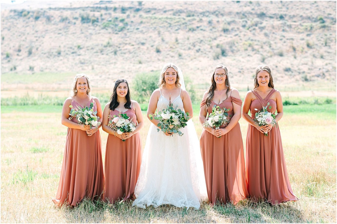 Party Barn at HJ Ranch Wedding bridesmaids in mauve dresses