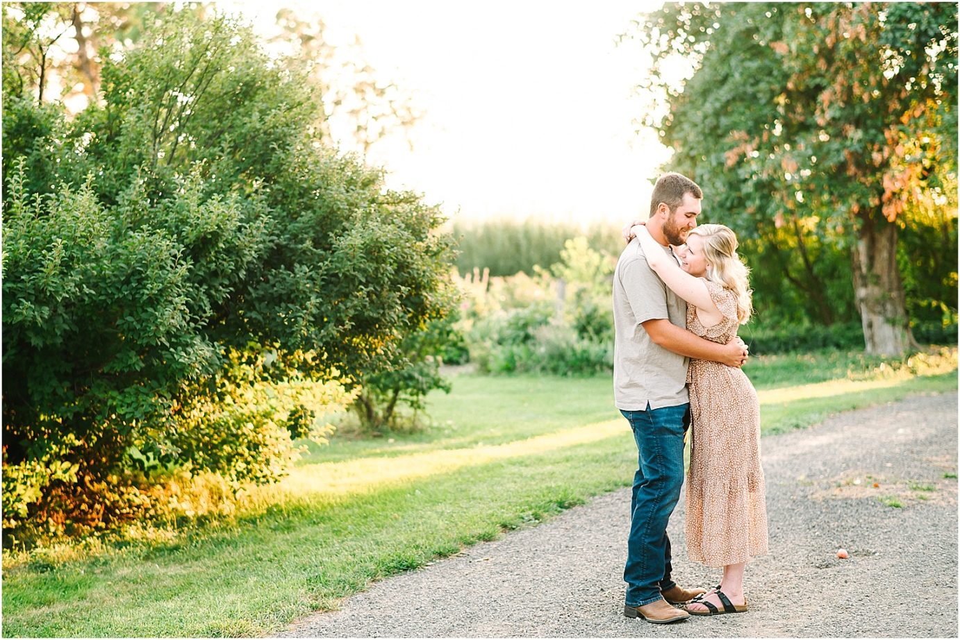 couple hugging during their garden engagement session