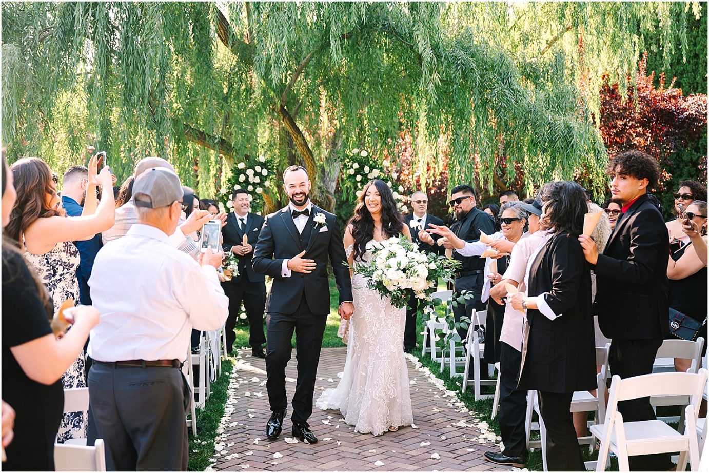 Wedding at Promise Garden bride and groom processional