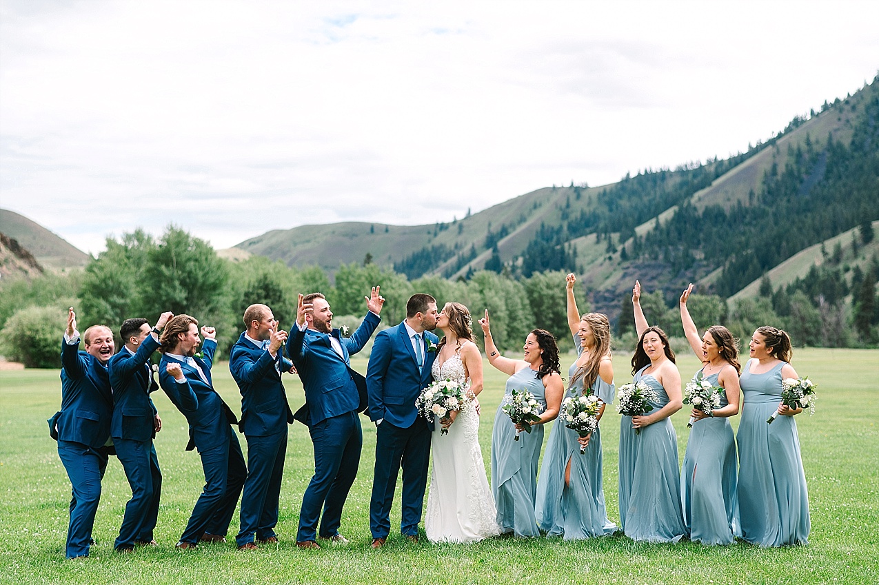 American Homestead Wedding Naches Photographer Bailey and Nikkie full wedding party cheering for the couple