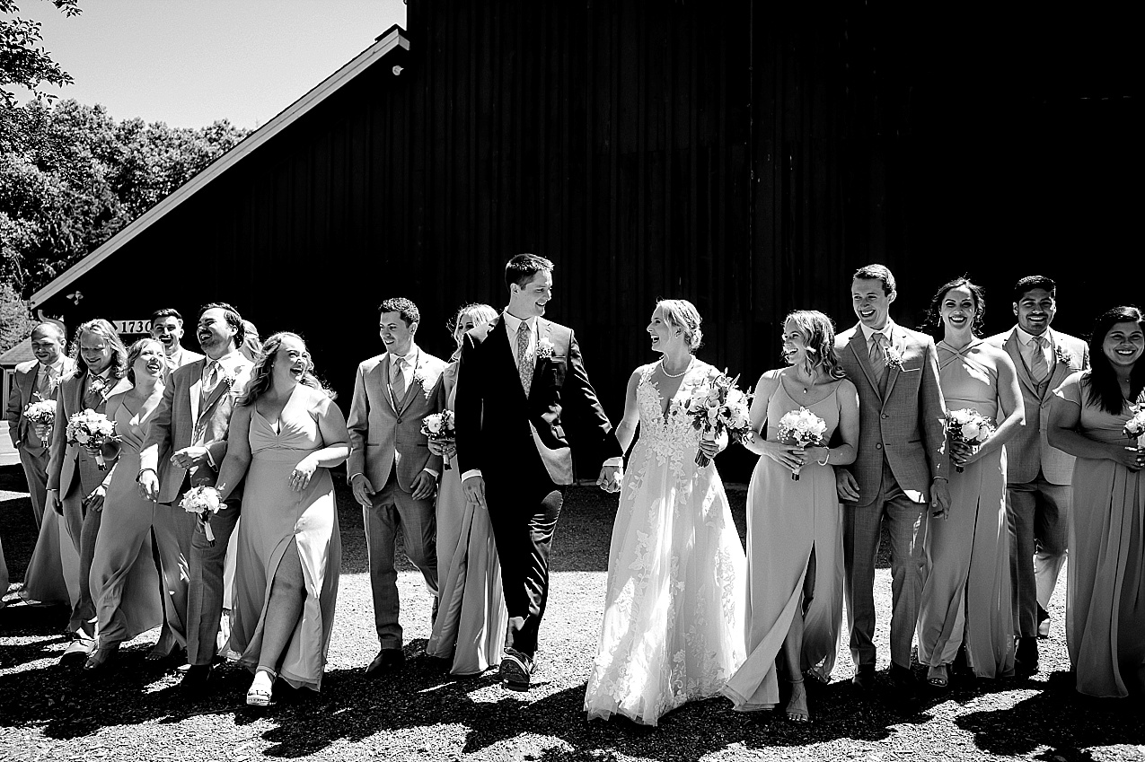 Pickering Barn Wedding Wedding party in front of dairy barn