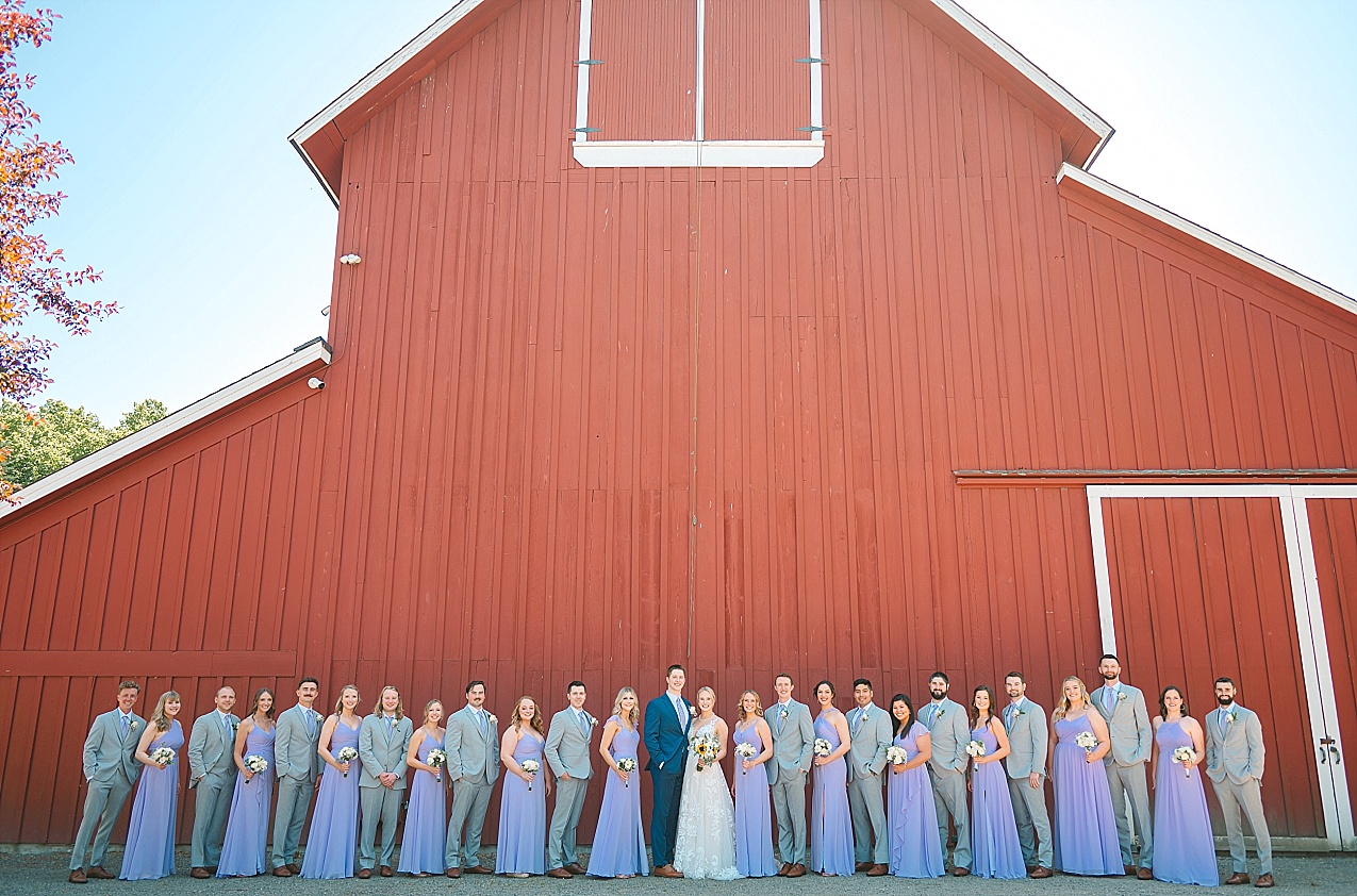 Pickering Barn Wedding Wedding party in front of dairy barn