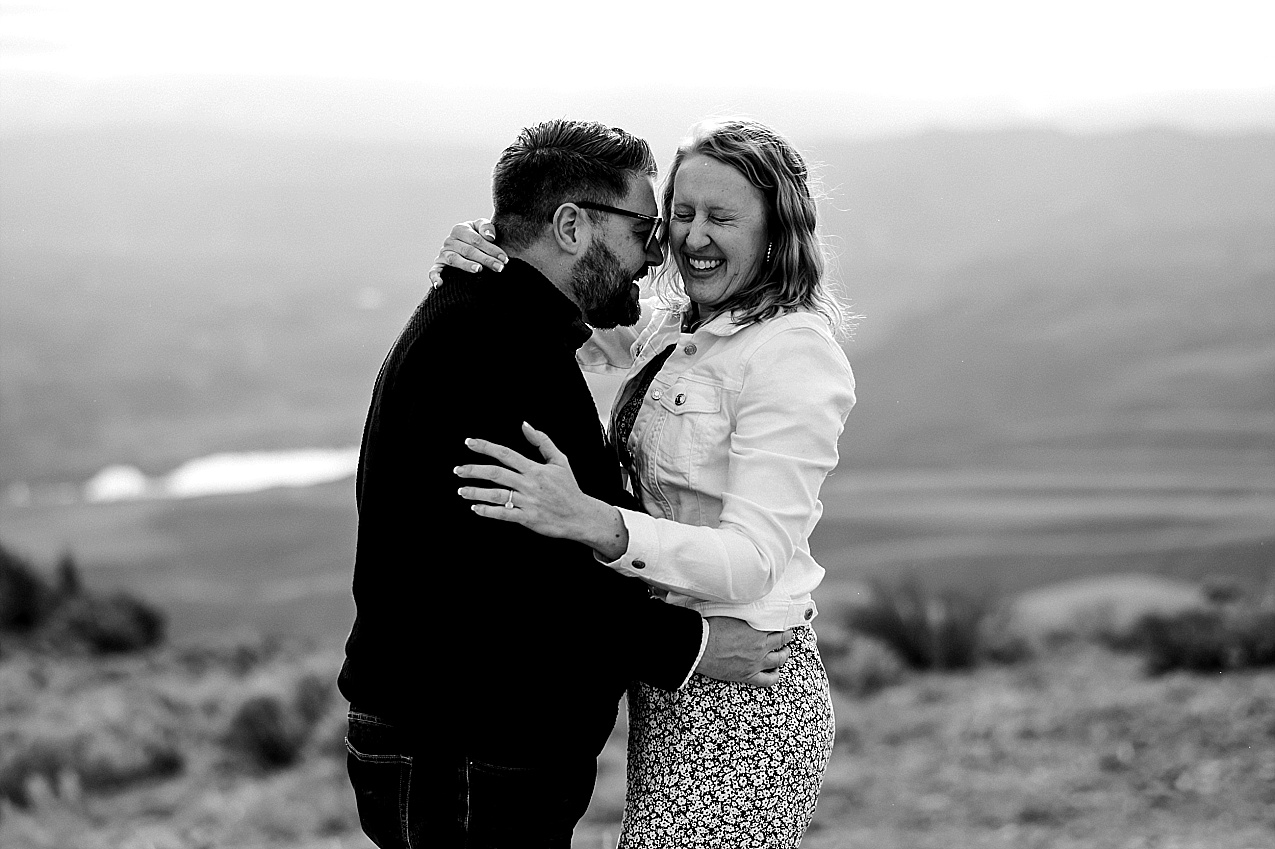 Chelan mountaintop engagement session chelan photographer aaron and leia couple laughing on a mountain