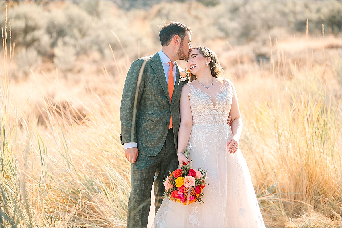 Colorful Two Point Ranch Wedding Soap Lake WA Kirin and Cindy bride and groom snuggling
