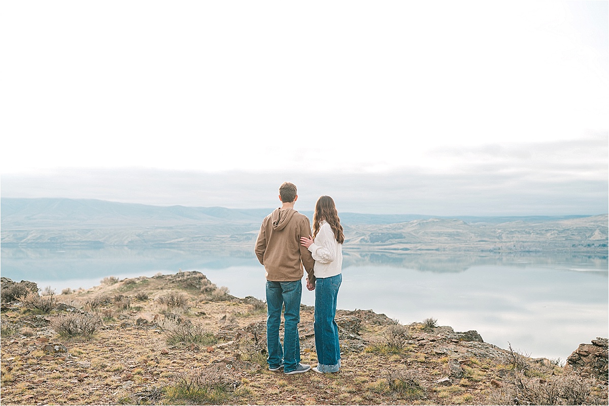 columbia river Engagement Session Garrett and Jaycee looking at the river