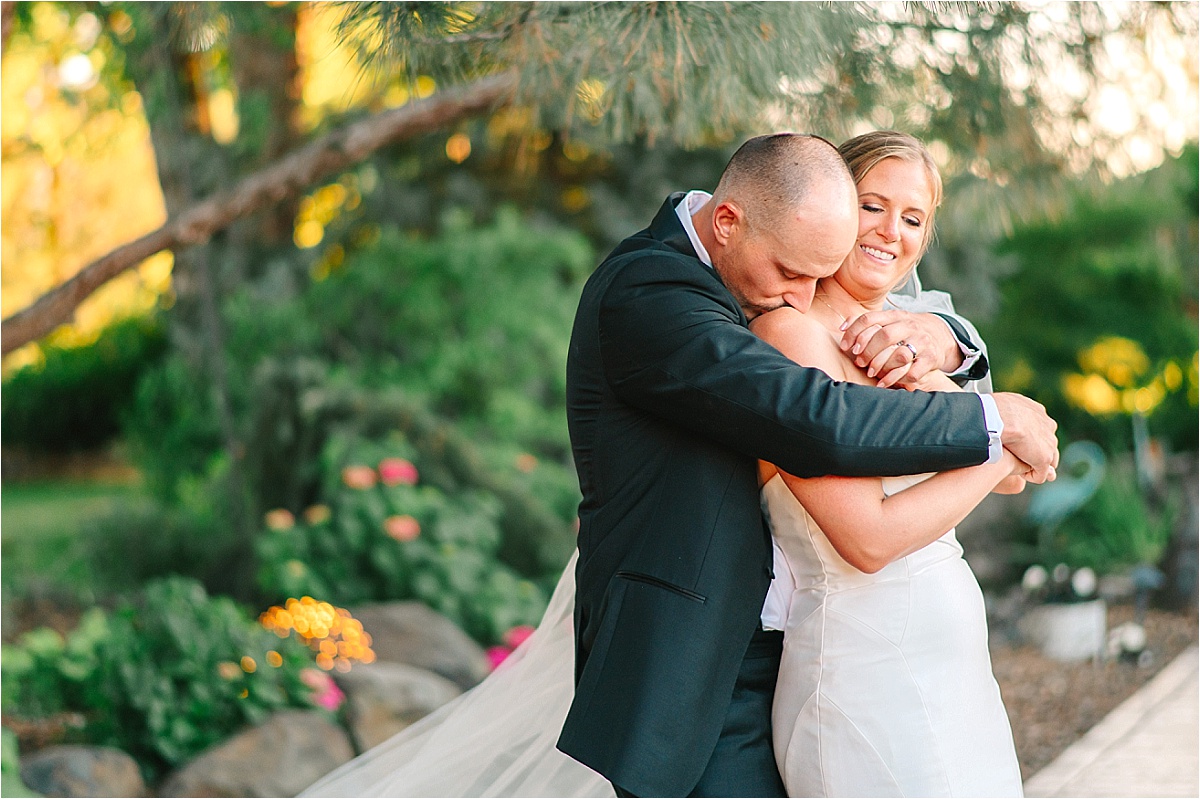 Sugar Pine Barn Wedding Benton City Photographer sunset portraits of bride and groom with a veil