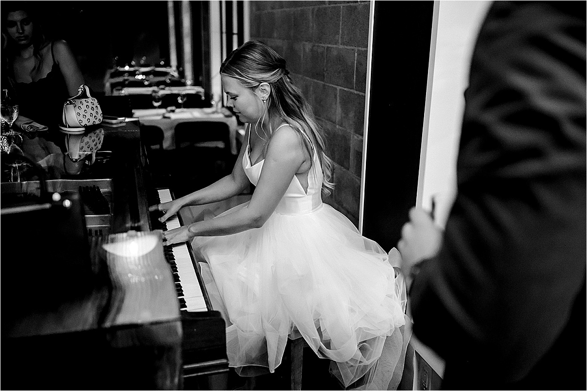 Genesis Farm and Gardens Wedding Enumclaw Bob and Anastasia after party at primos bride playing piano
